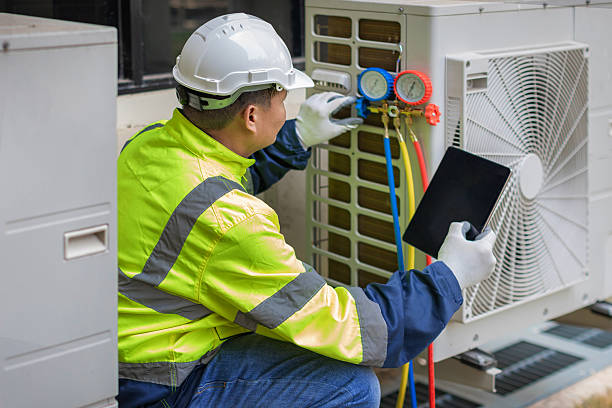 Professional Air Conditioning Repair technician working in Freeland, PA